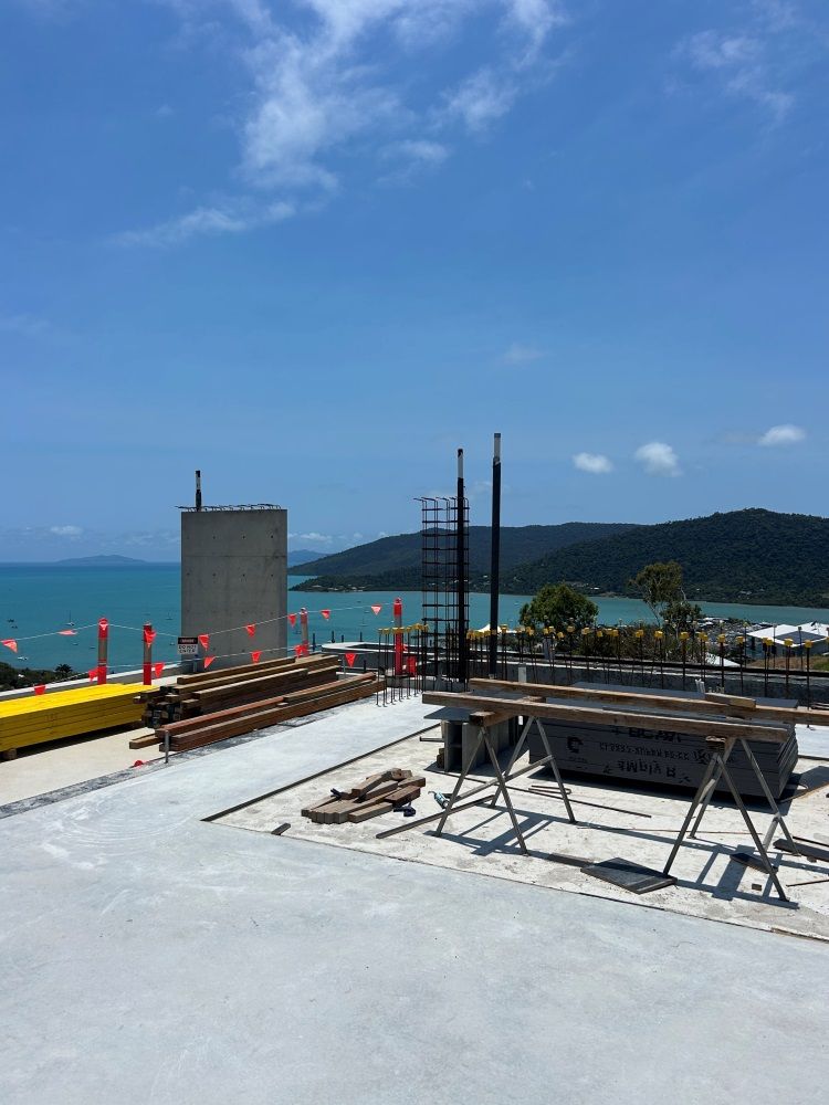 A Construction Site With An Ocean View — Rock Plumbing & Gasfitting In Cannonvale, QLD