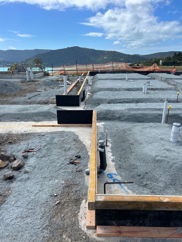 A Construction Site With A Blue Sky — Rock Plumbing & Gasfitting In Cannonvale, QLD