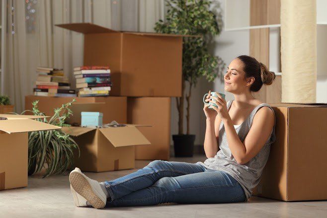 Woman Resting Holding Mug — Royal Oak, MI — O'Sullivan Moving & Storage