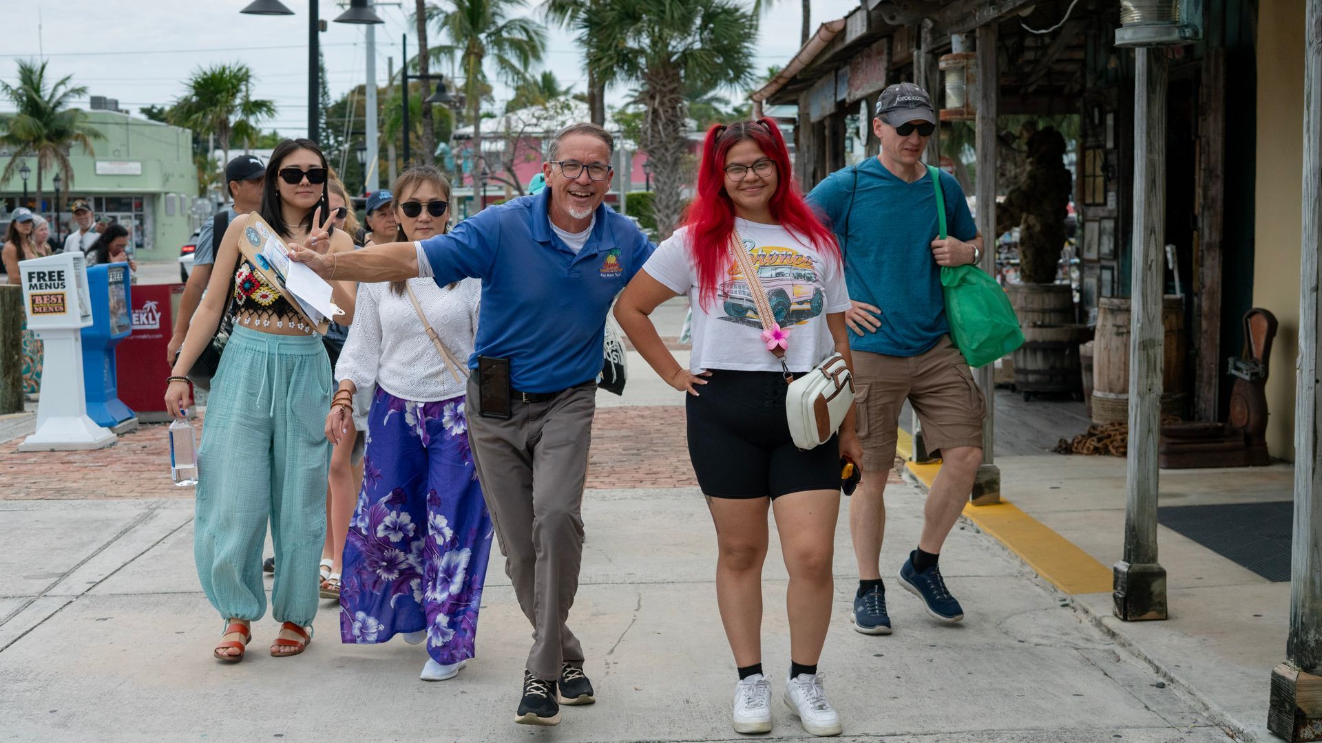 Miami to Key West Bus tour passenger and tour guide happy in Duval Street