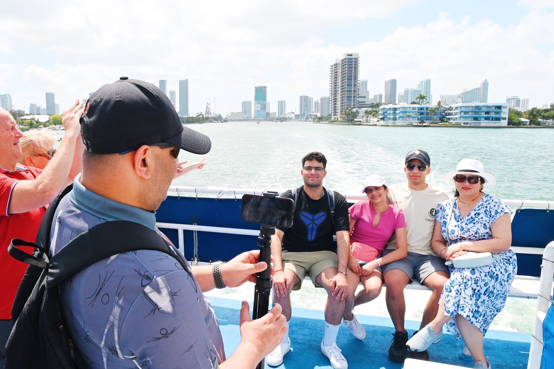 Family taking photos with the Miami Skyline in the Background