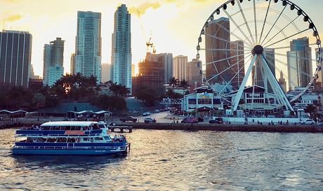 Sunset cruise with city skyline