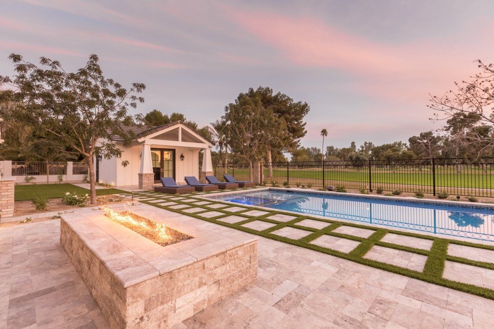 There is a fire pit in the middle of the pool.