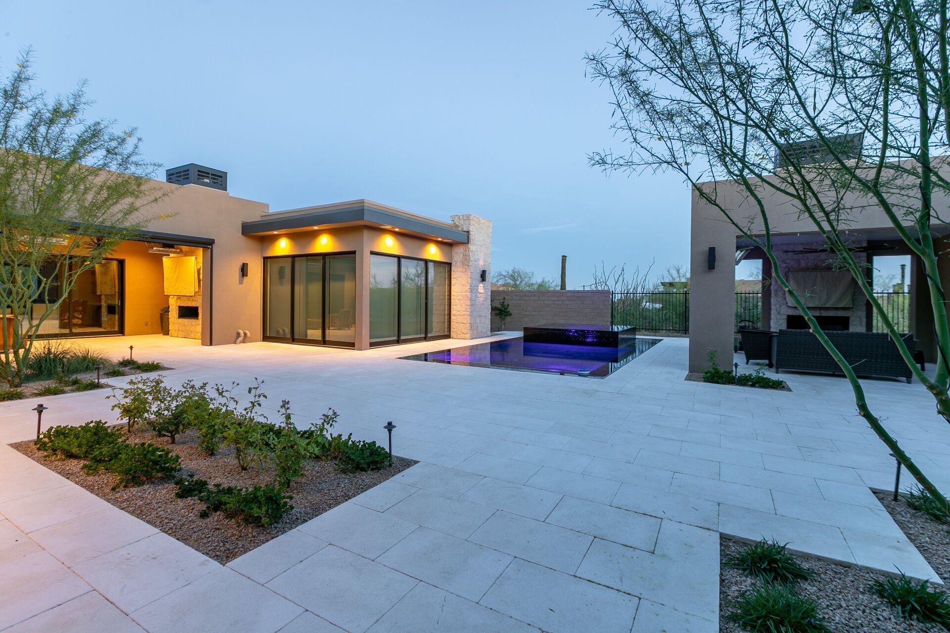 A large house with a swimming pool in the backyard