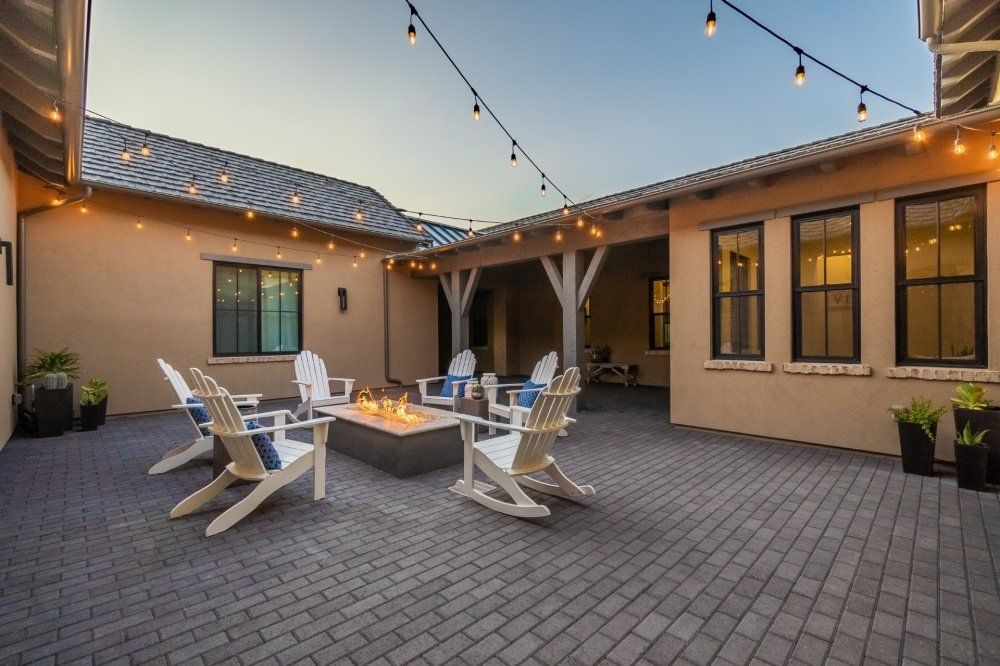 There is a fire pit in the middle of the courtyard.