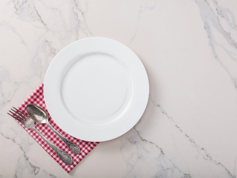 White Plate On Marble Kitchen — Worcester County, MA — Cassa Kitchen & Bath Design & Remodeling Center