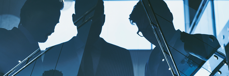 Image of people working at a desk