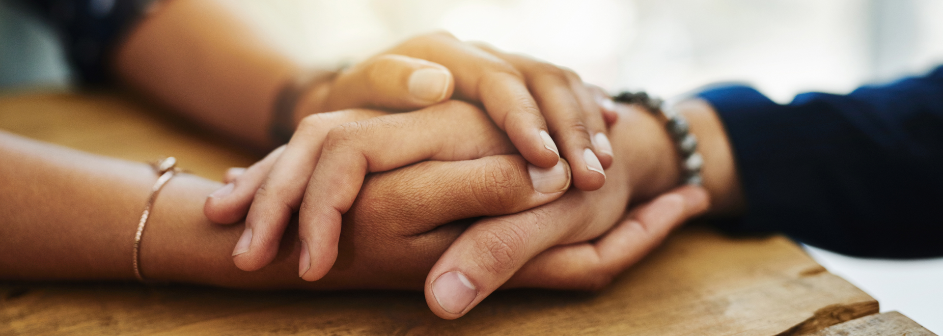 Picture of a person comforting someone else. Picture of a person comforting someone else.