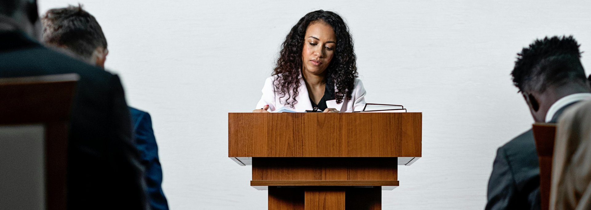 Picture of a celebrant leading a funeral ceremony. Picture of a celebrant leading a funeral ceremony.