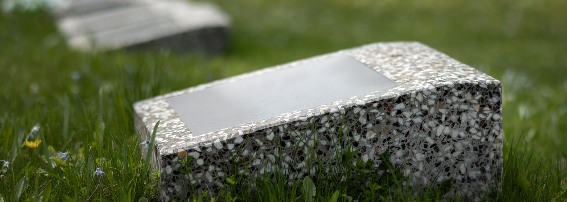 Picture of a modern grave with a simple grave marker. Picture of a modern grave with a simple grave marker.