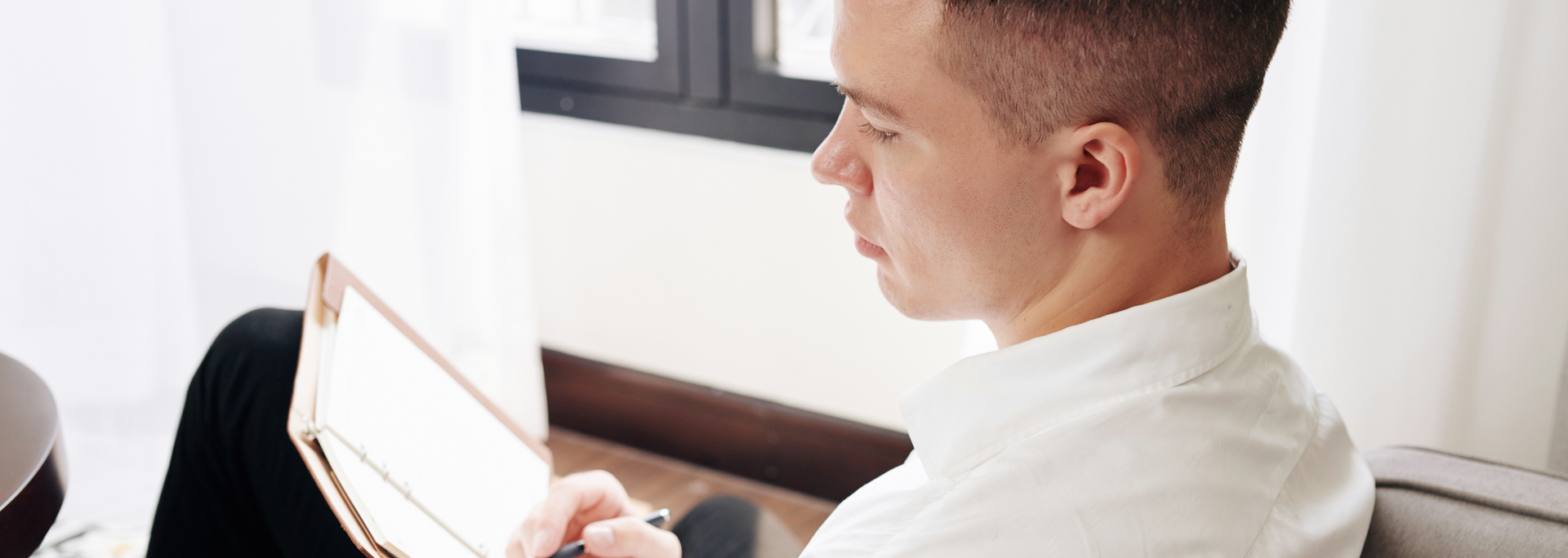 Picture of a person sitting down, looking thoughtful. Picture of a person sitting down, looking thoughtful.