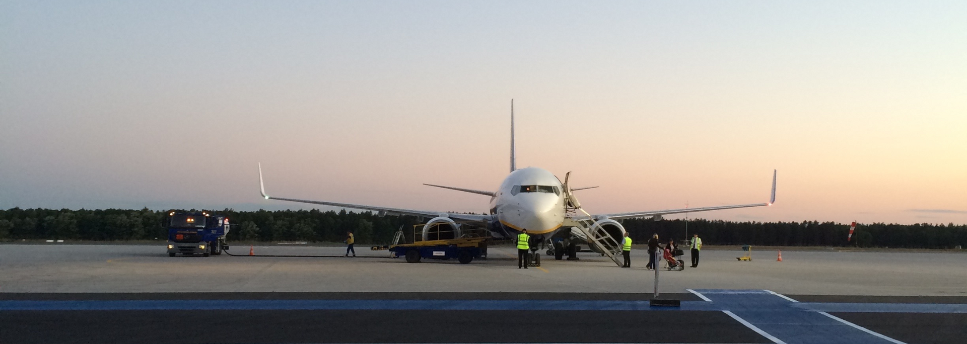 Picture of an aeroplane waiting on a runway. Picture of an aeroplane waiting on a runway.