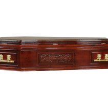A wooden coffin with gold handles on a white background.