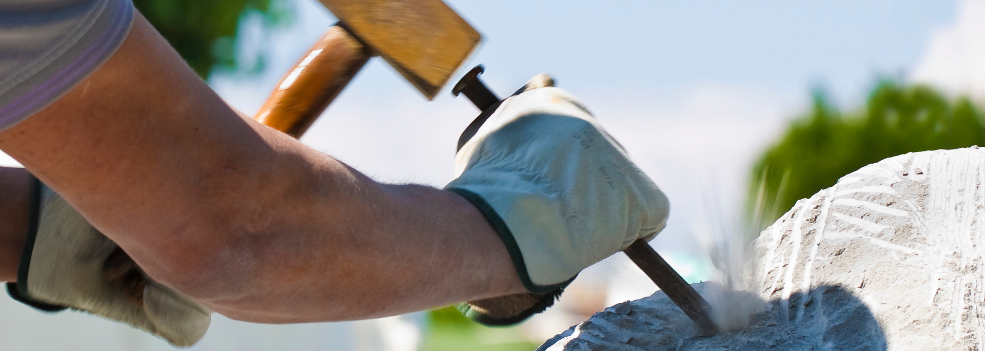 Picture of a headstone being carved. Picture of a headstone being carved.