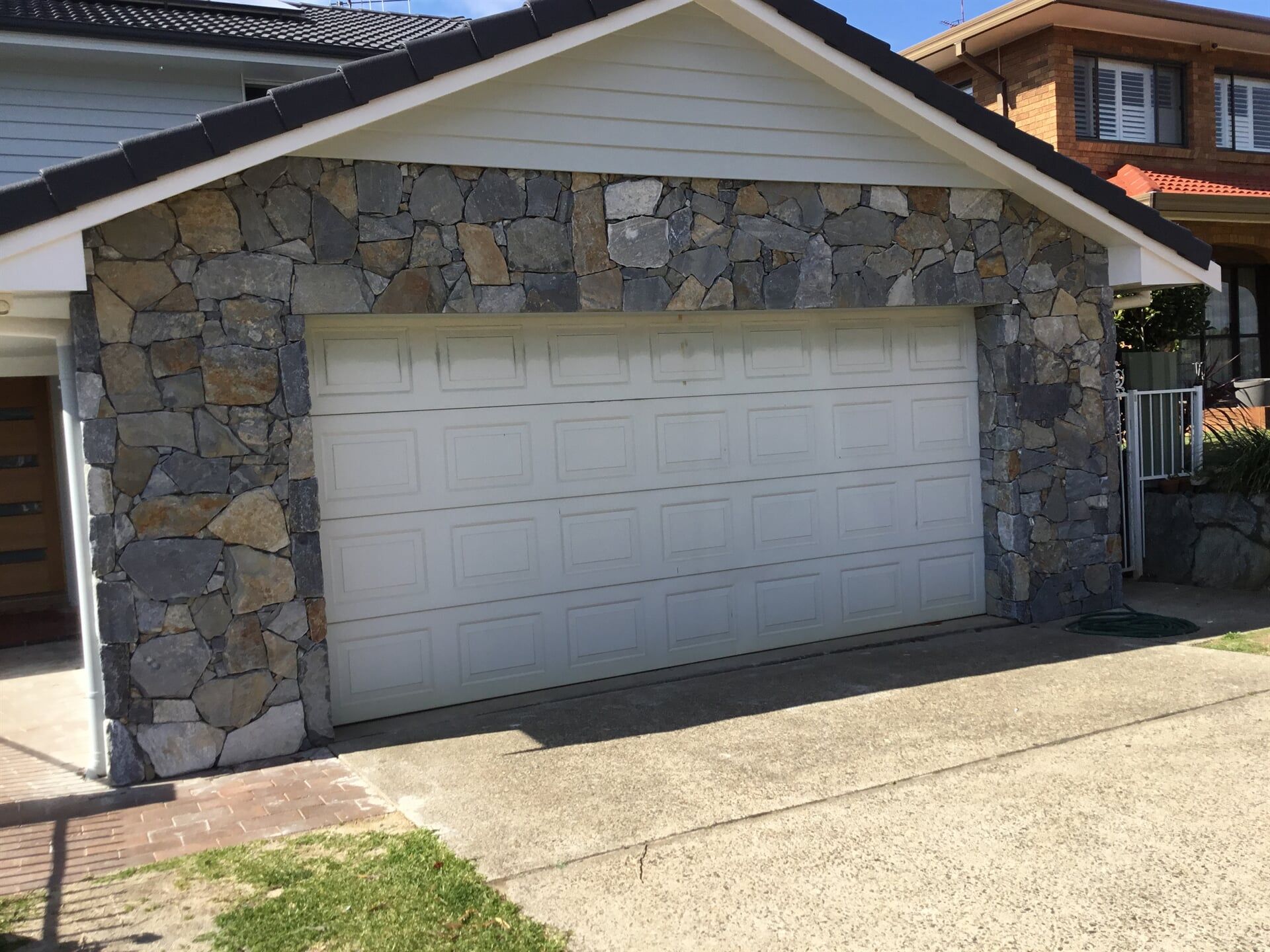 Rock Retaining Wall around Garage - Structural Landscaping in Port Macquarie, NSW