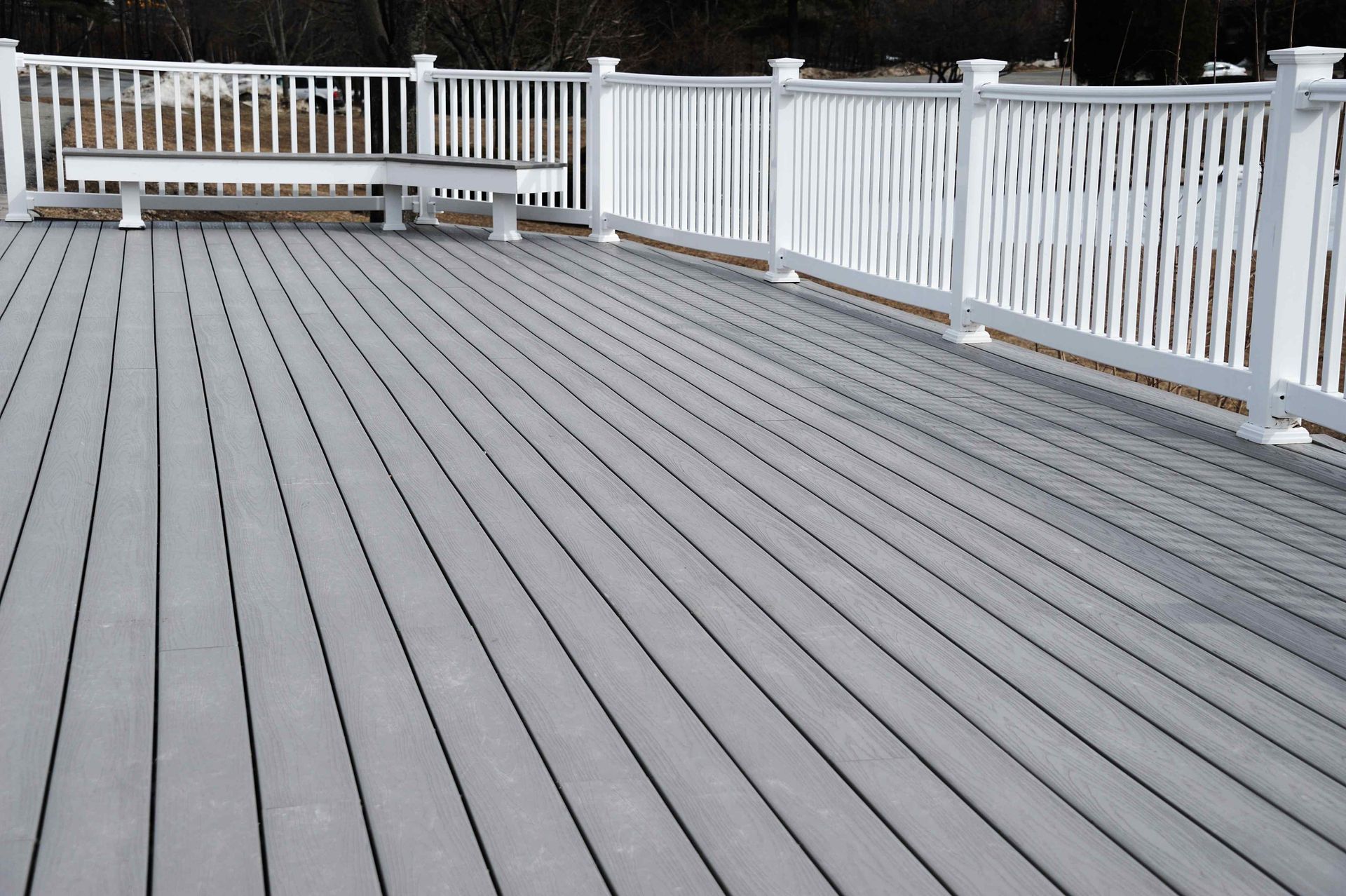 Homeowner reviewing deck project budget in Everett WA

Composite vs wood deck material comparison fo