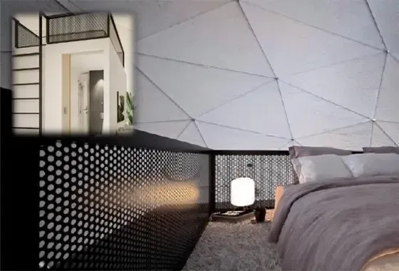 Moderne slaapkamer met geometrisch plafond, geperforeerde zwarte balustrade en een vide.
