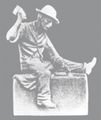 A statue of a man sitting on a box holding a hammer