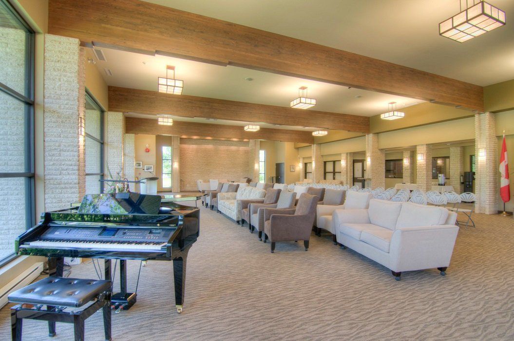funeral centre room with black piano