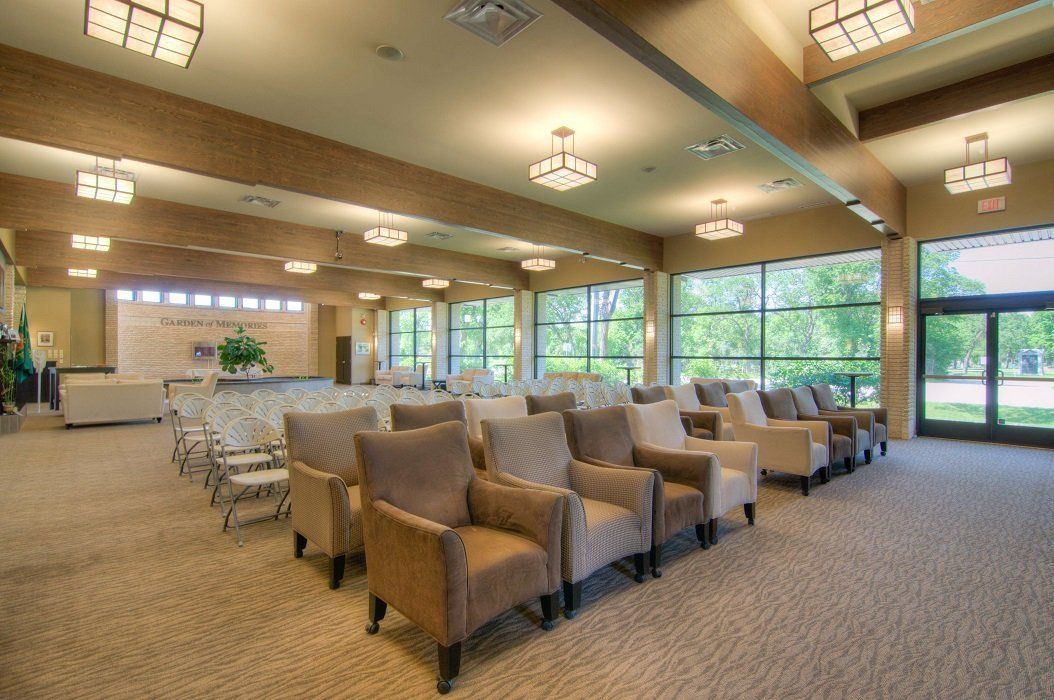 funeral centre room with comfortable chairs in front