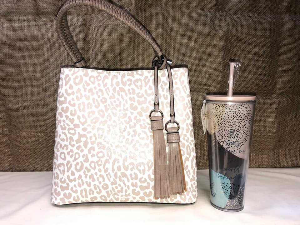 handbag and drink tumbler