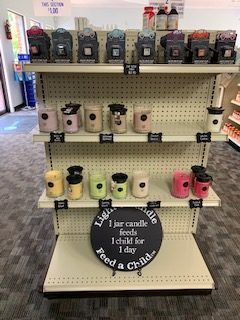 display of candles on store shelves