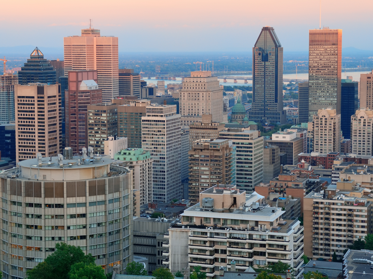 An aerial view of a city with lots of tall buildings