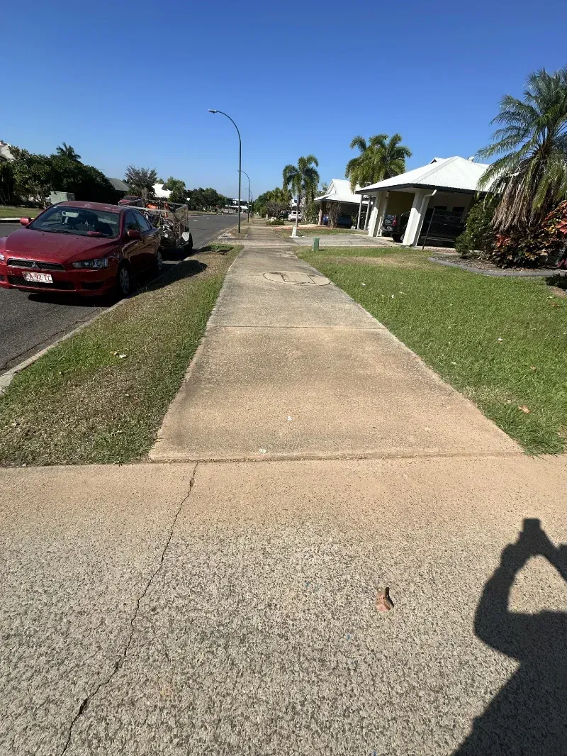Sidewalk Stretches Forward Between a Grass Verge — I Do It All in Caloundra, QLD