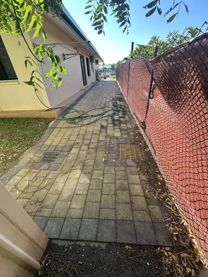Paved Side Path Between a Light-coloured House Wall — I Do It All in Maleny, QLD
