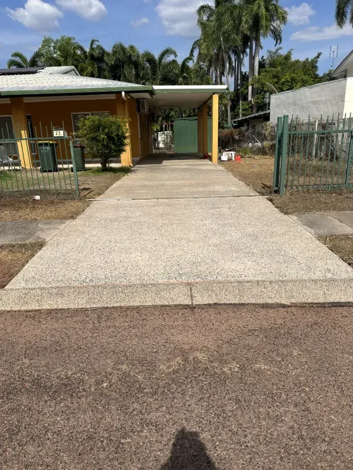 Concrete Driveway Leads to a Yellow House — I Do It All in Maleny, QLD