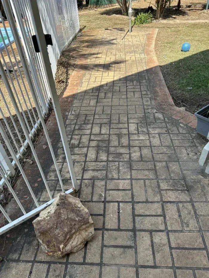 Tan Brick Paver Walkway Leading Into a Backyard — I Do It All in Caloundra, QLD
