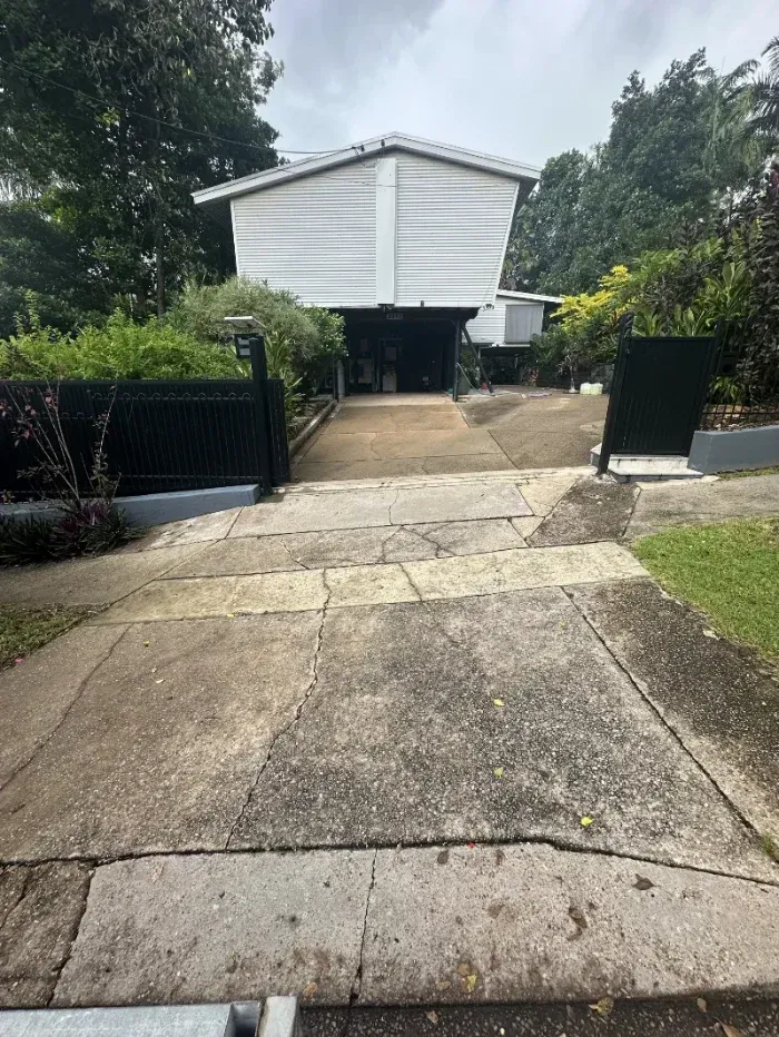 Concrete Driveway Leads Toward an Elevated White House — I Do It All in Coolum, QLD