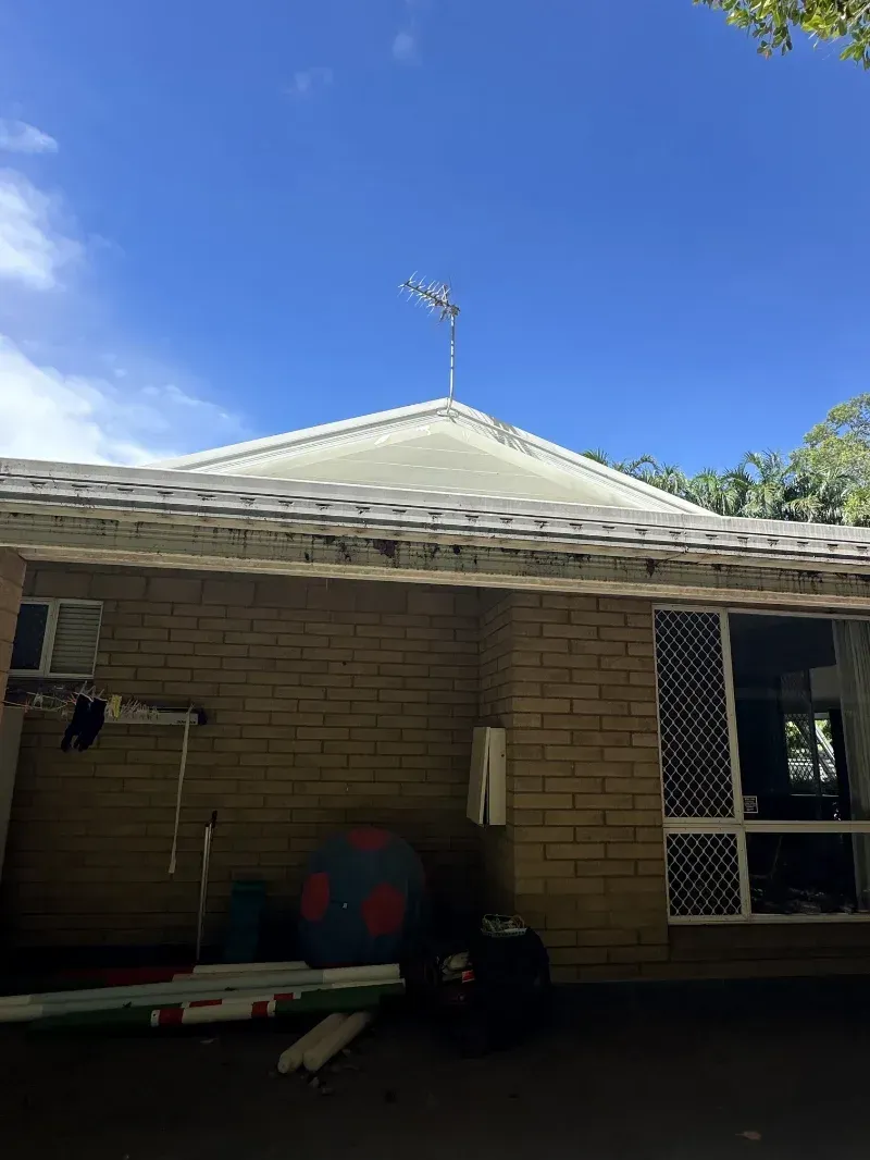 A Brick House Exterior with White-Trimmed Roof — I Do It All in Caloundra, QLD