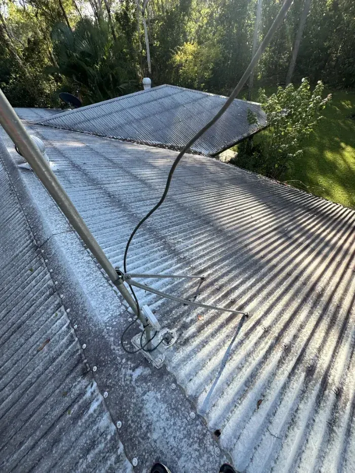 Broken Corrugated Metal Roof with Exposed Cables — I Do It All in Caloundra, QLD