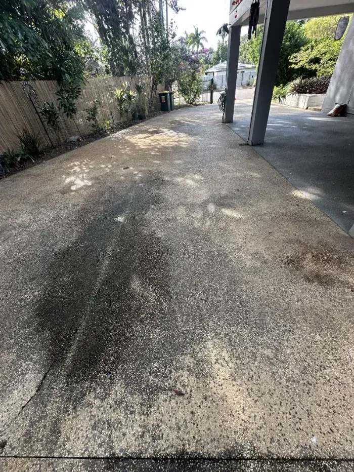 Concrete Driveway With a Large, Dark, Weathered Stain — I Do It All in Caloundra, QLD