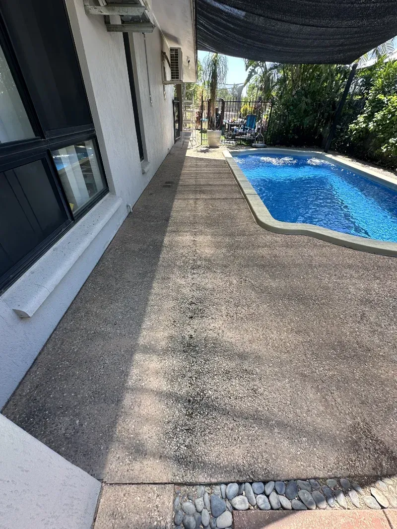 Narrow Backyard Patio Beside a Blue Swimming Pool — I Do It All in Caloundra, QLD