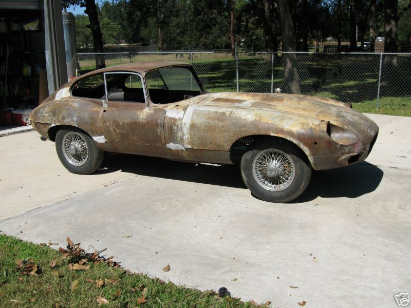 A rusty Jaguar is in need of a restoration