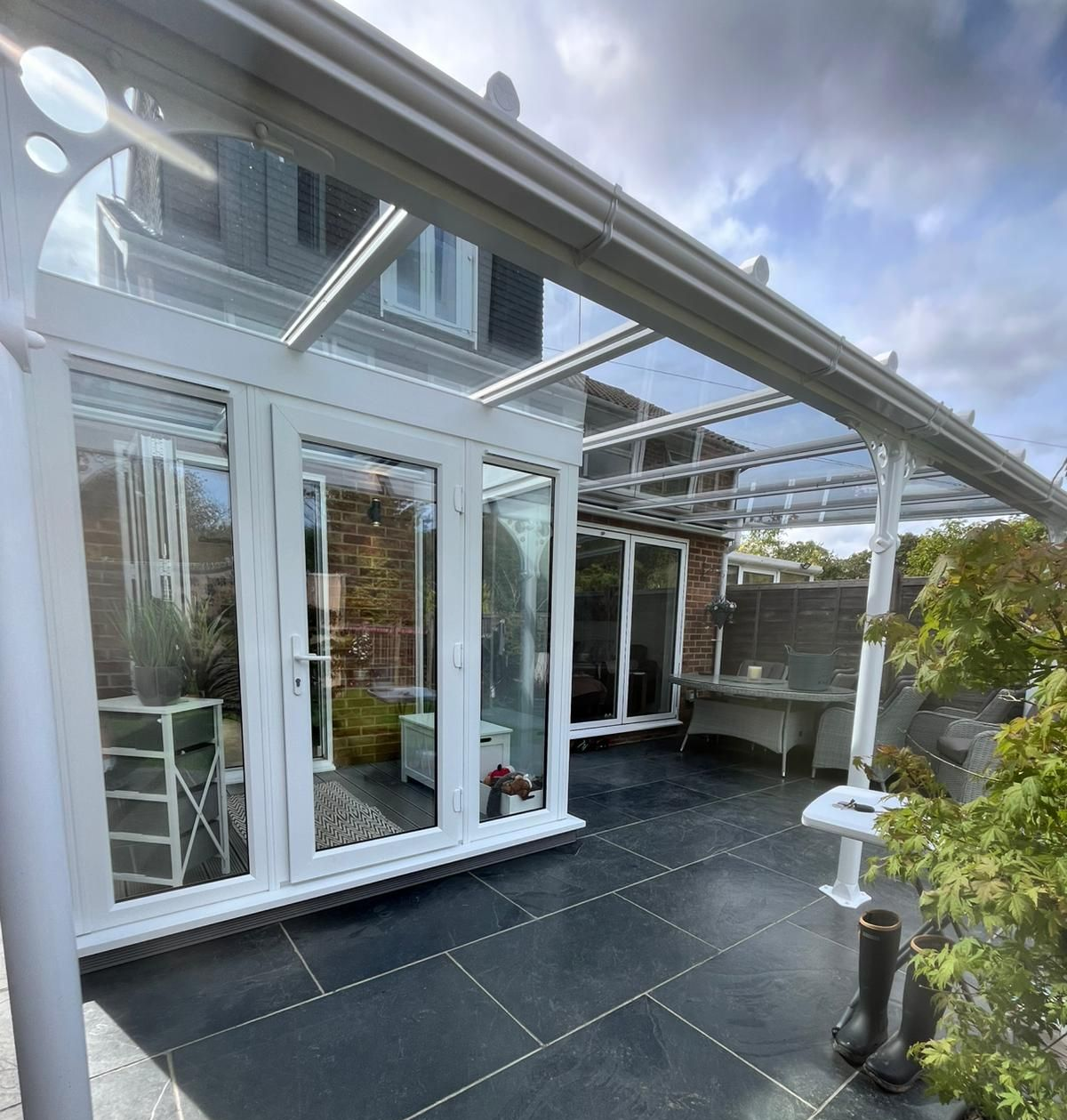 Exterior view of a PVCu porch and verandah in Sussex