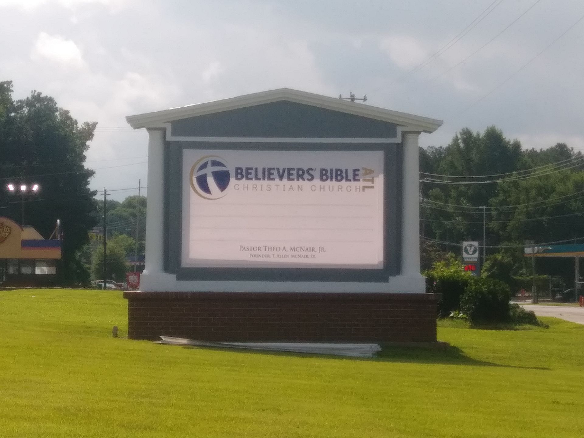 A large sign that says believers bible on it