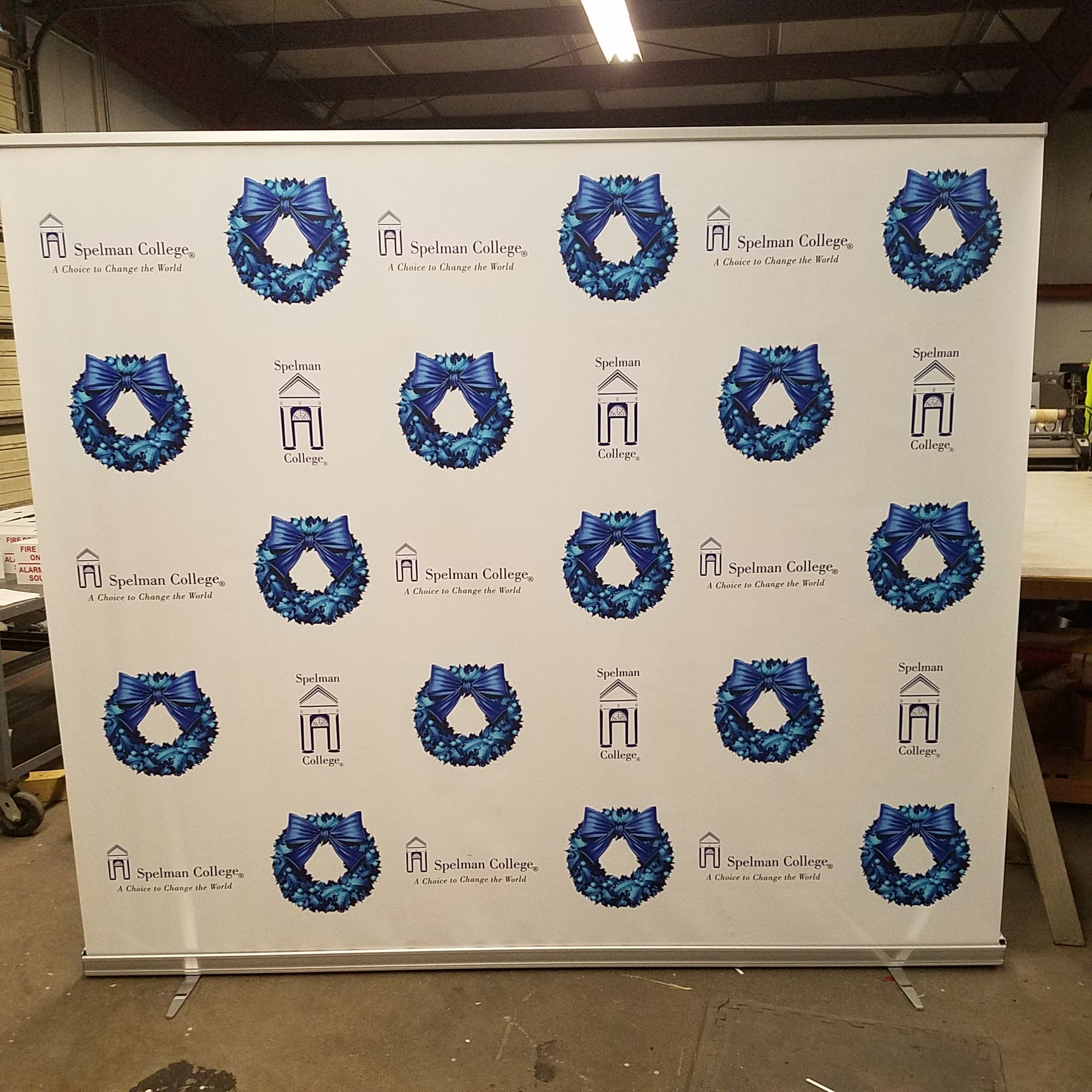 A large white board with blue circles and letters on it