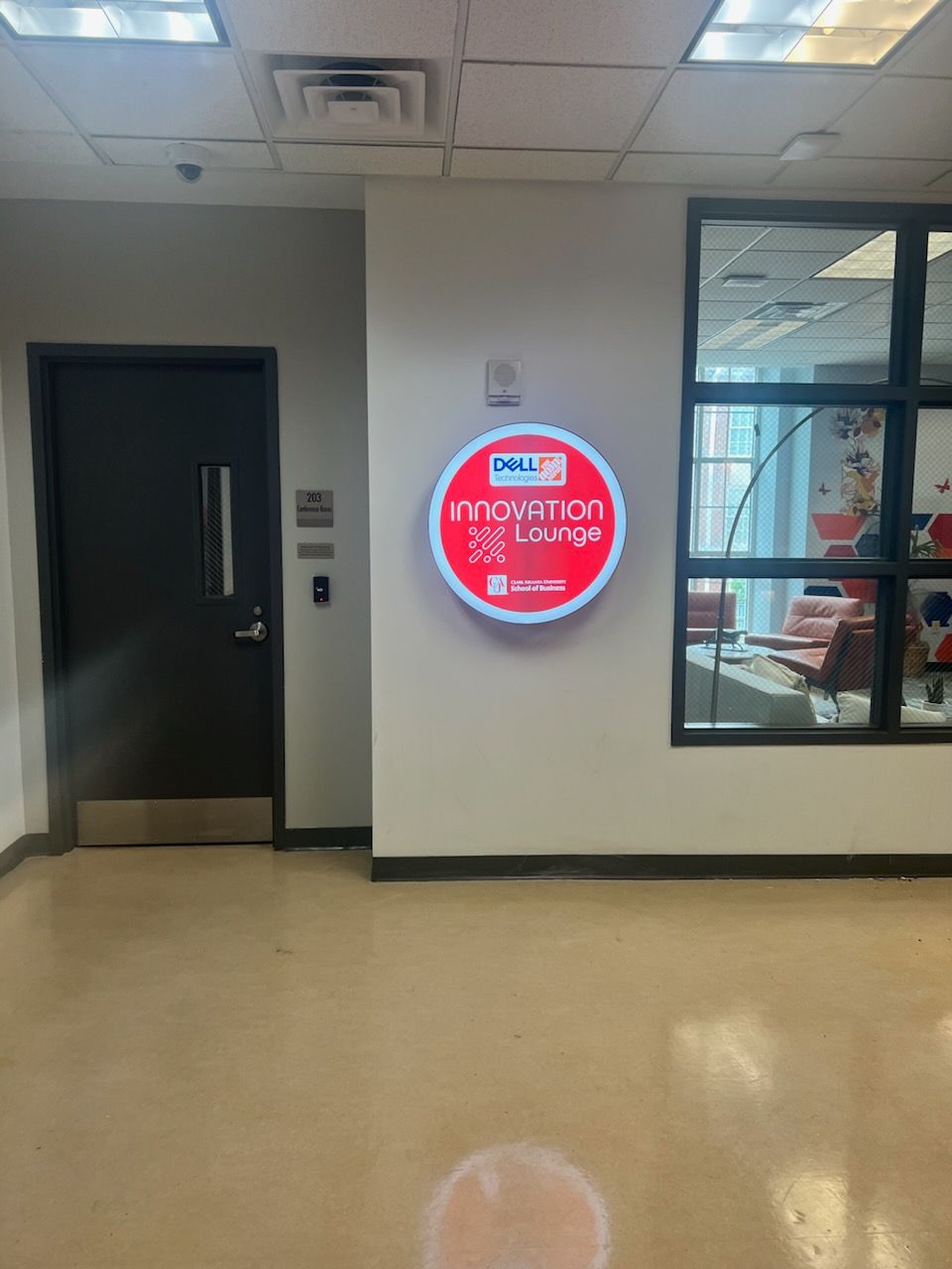 A room with a sign that says innovation lounge