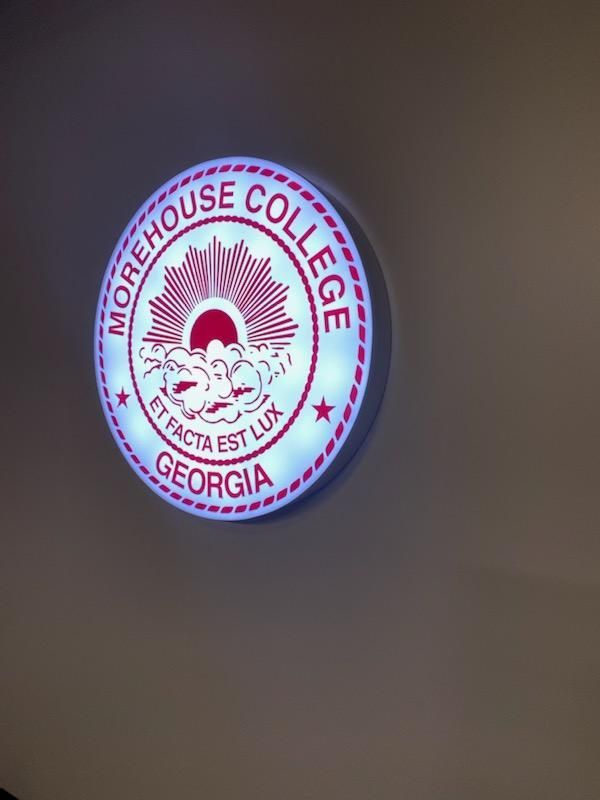 A sign that says morehouse college georgia on it