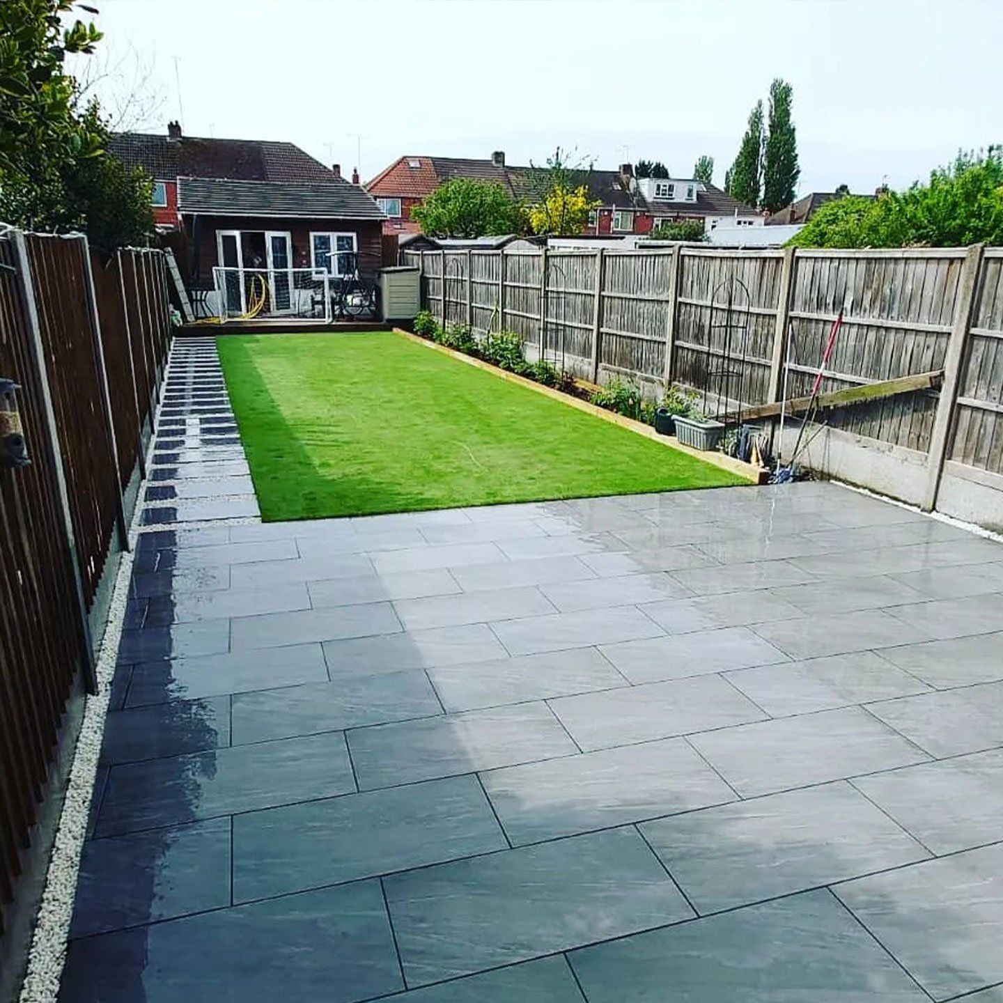 Marble patio installed by DNA Landscapes
