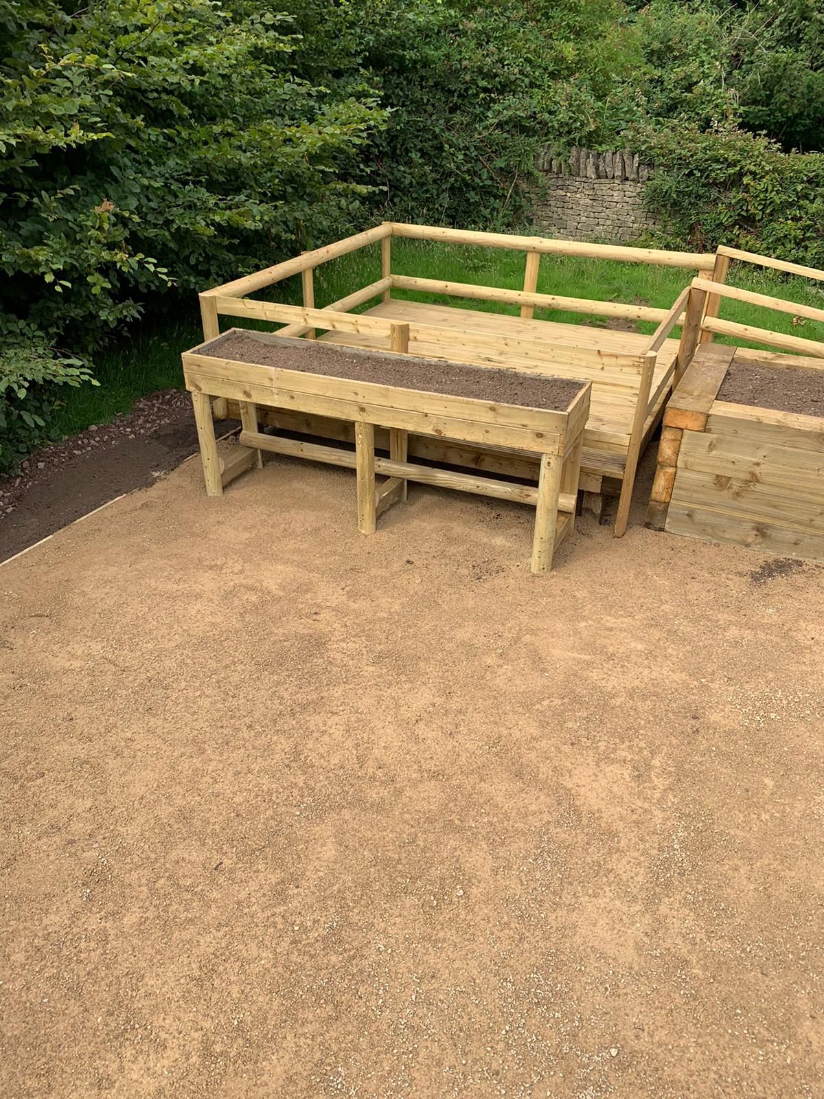 DNA Landscapers Kenilworth wooden raised flower beds and decking