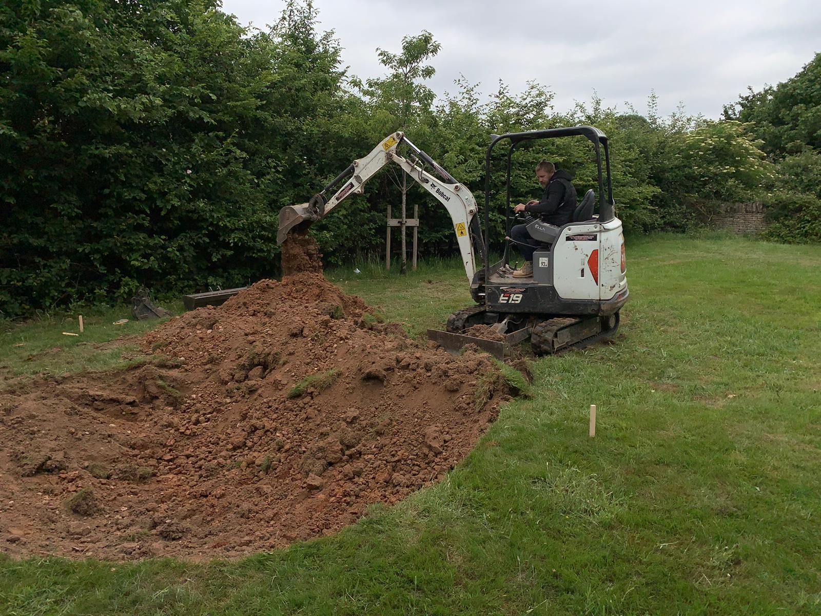 DNA Landscapes digging a pond out in Kenilworth