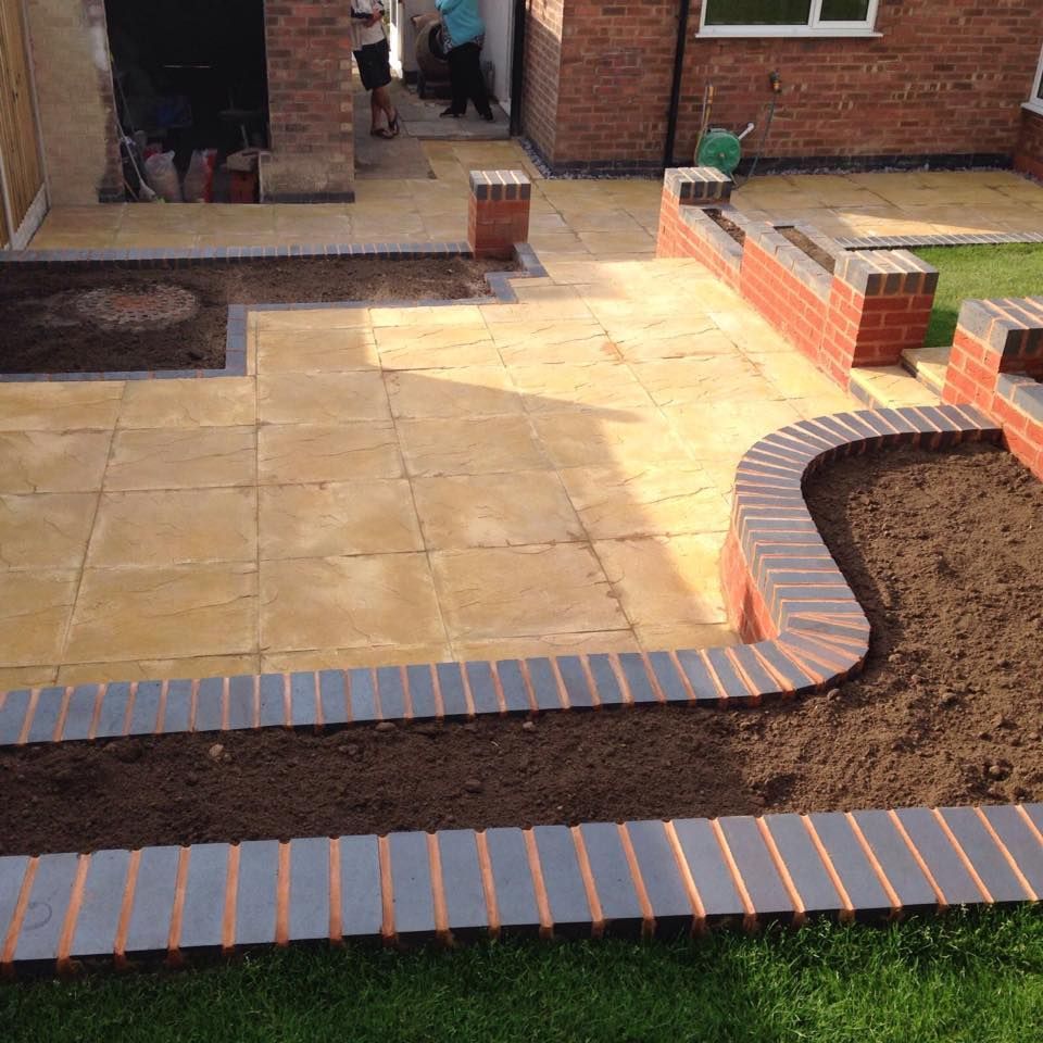 DNA Landscapes hard landscaping in Coventry showing raised beds within the curved walls