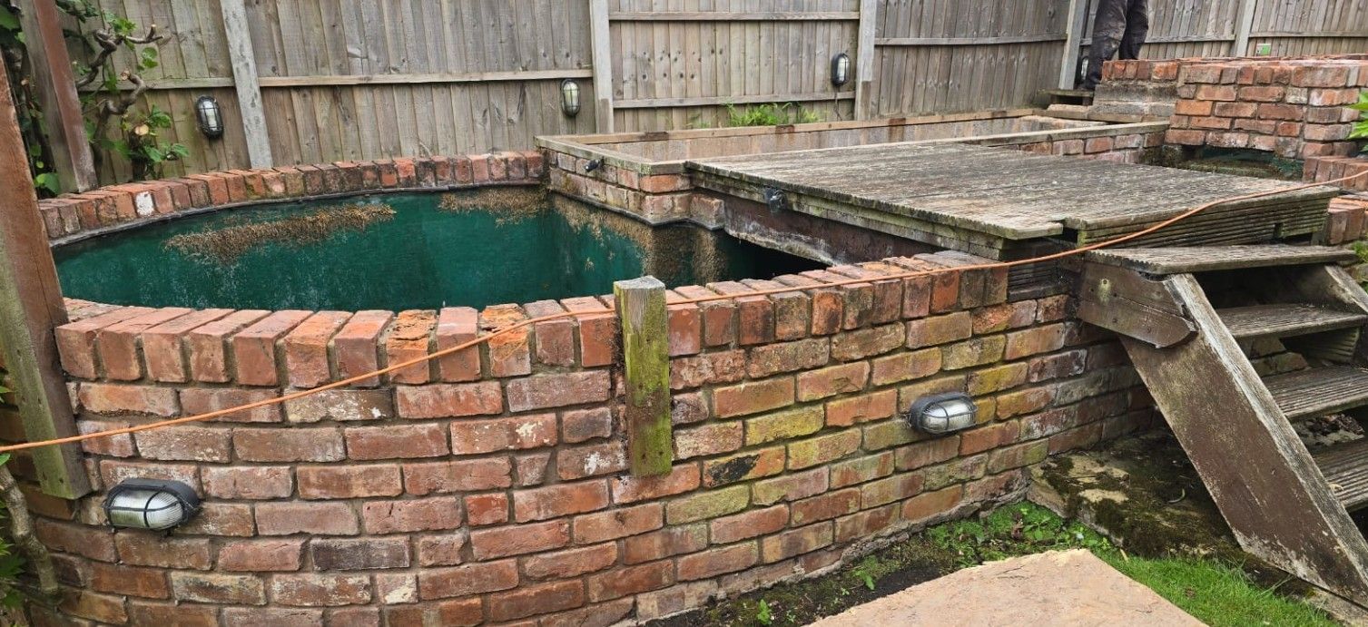 Existing brick pond to be utilised in the new garden design in Galley Common