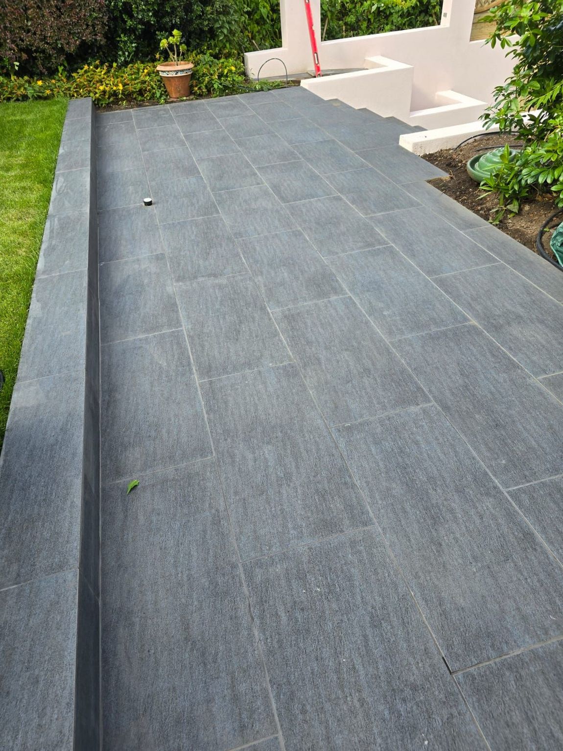 After DNA Landscapes had completed the landscaping garden build for new garden turn, edging and paving