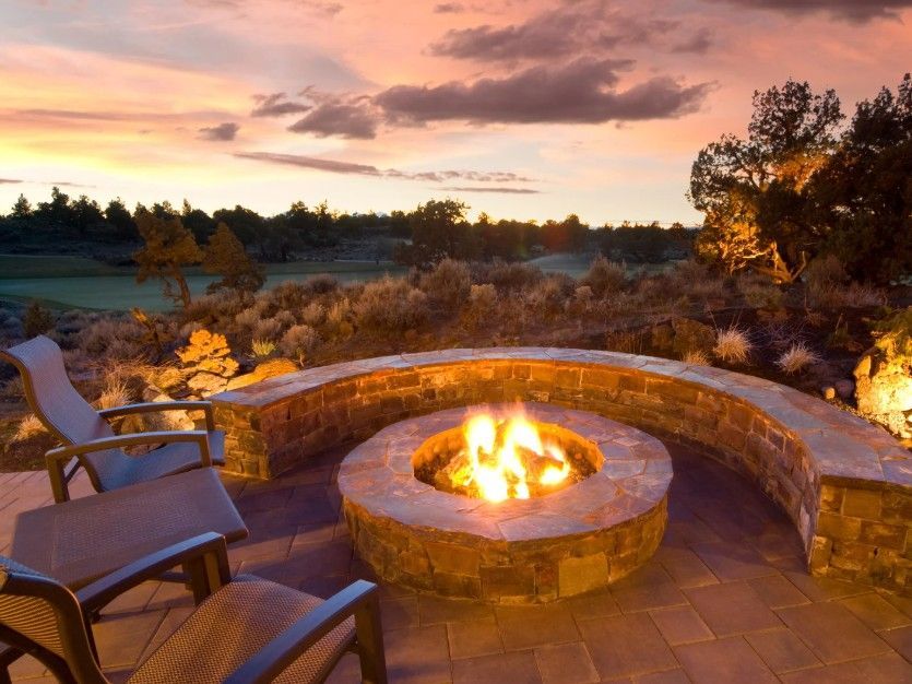 a garden in autumn with a fire pit