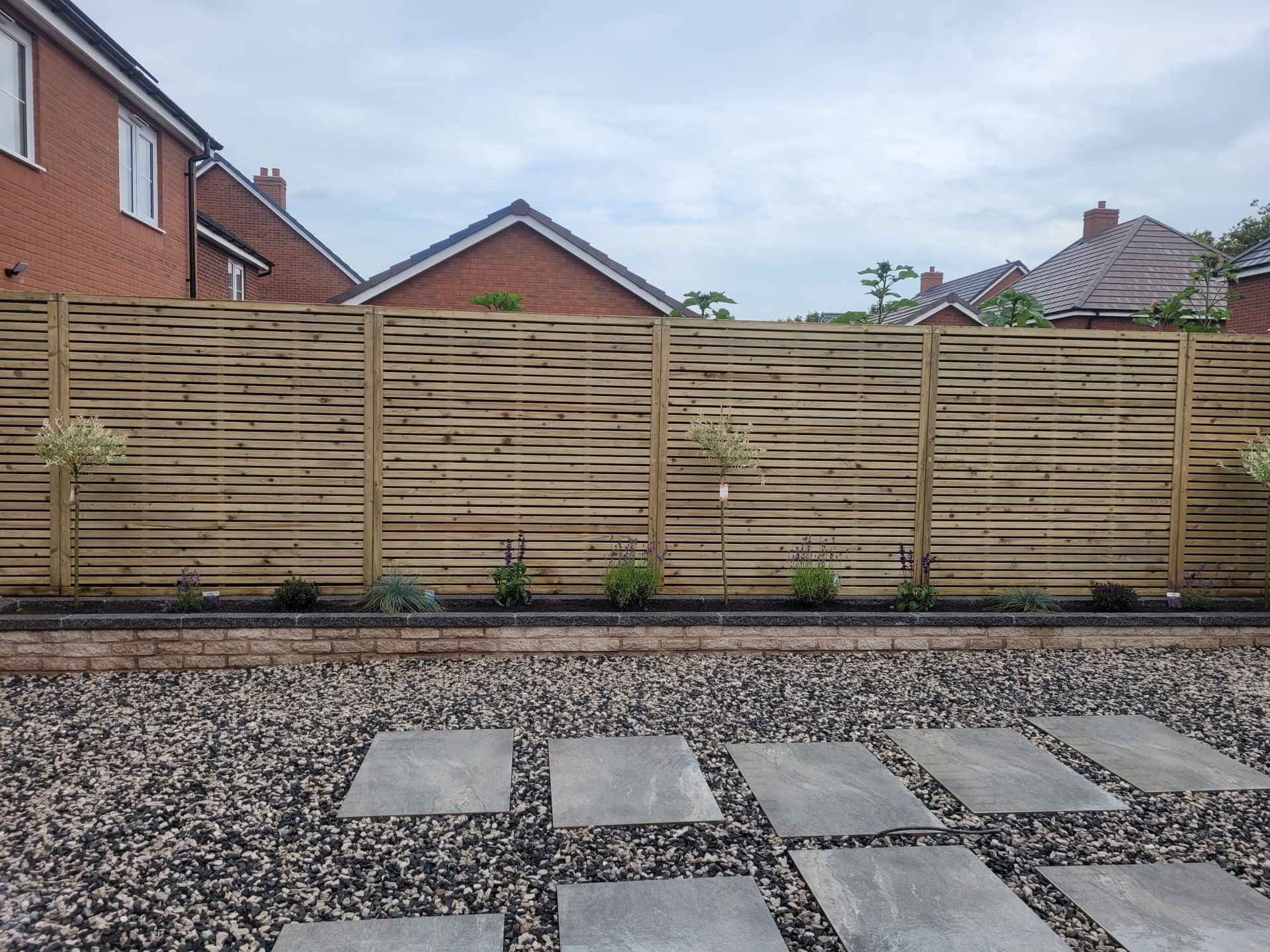 DNA landscapes new garden fence as part of the landscaping project in Solihull